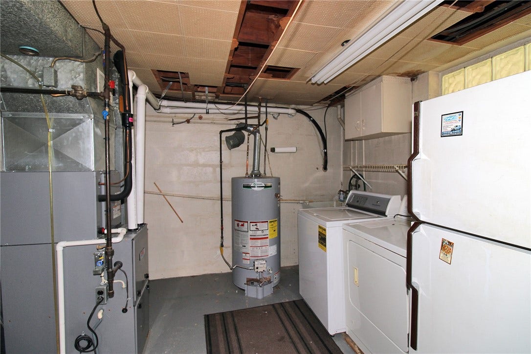 Dedicated laundry area with washer and dryer.