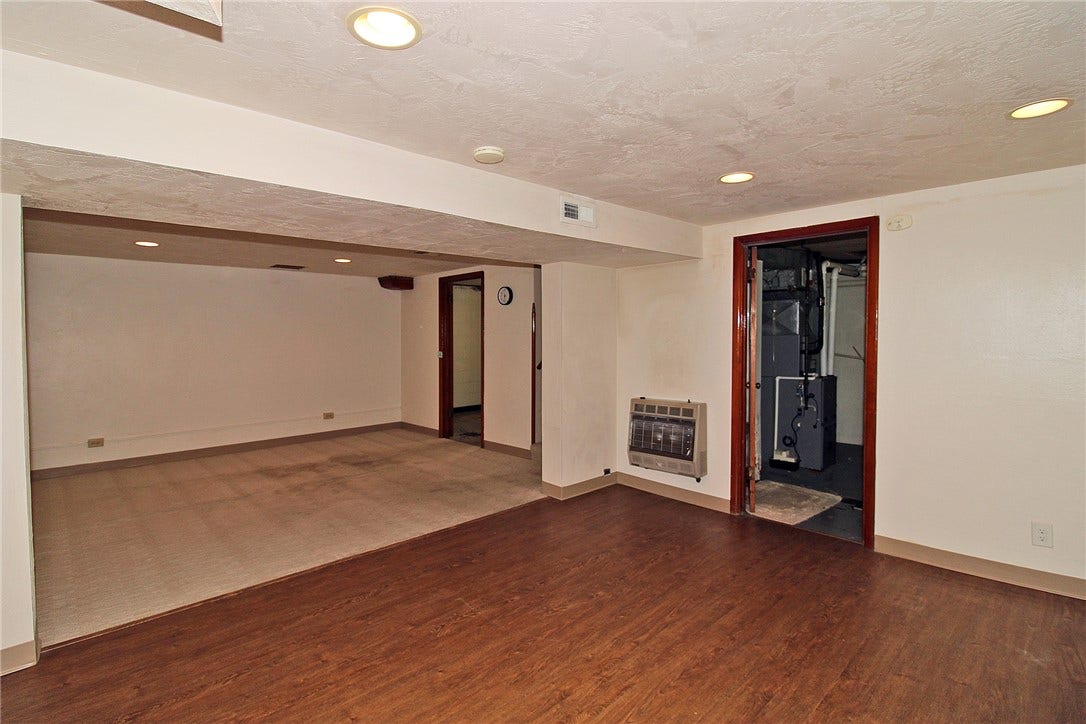 Gameroom.  Imagine your own creative touches in this walk out gameroom.