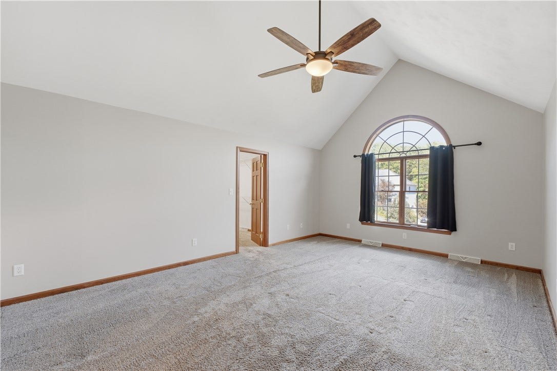 The large Primary Bedroom is approximately 13'x19' and features a vaulted ceiling, Palladium window, large walk-in closet, and gorgeous en-suite bathroom with double sinks, a soak tub, standalone shower, and even heated floors!