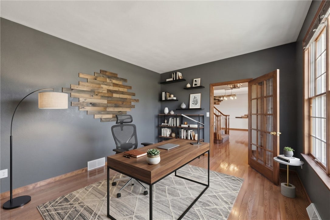 The Den has been digitally staged to inspire decorating ideas! This room is very versatile and could be used for a family room, office, sitting room, or even a play room for the kids!