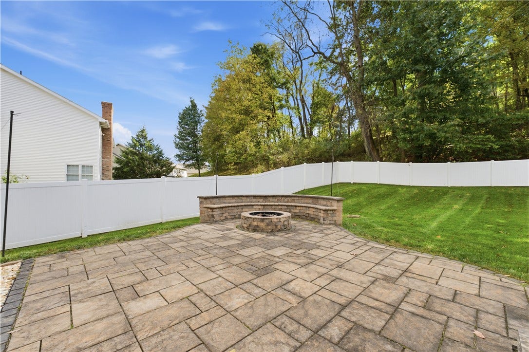 This extra patio area is a perfect place to kick back and enjoy an evening around a fire