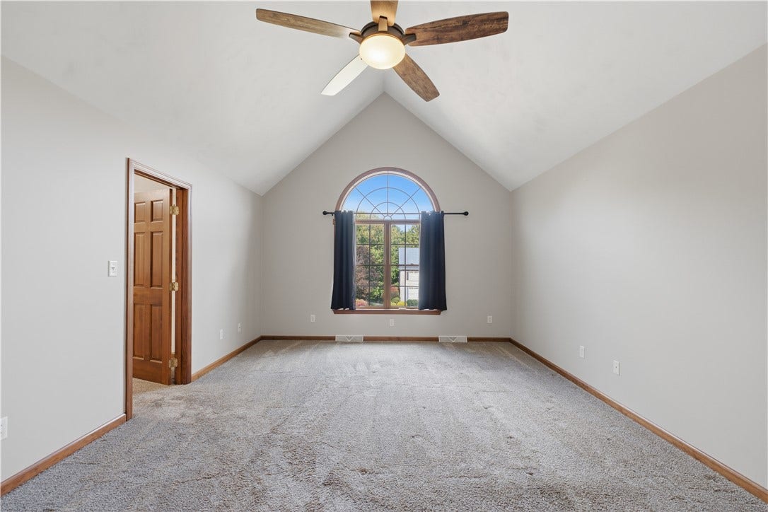 The large Primary Bedroom is approximately 13'x19' and features a vaulted ceiling, Palladium window, large walk-in closet, and gorgeous en-suite bathroom with double sinks, a soak tub, standalone shower, and even heated floors!