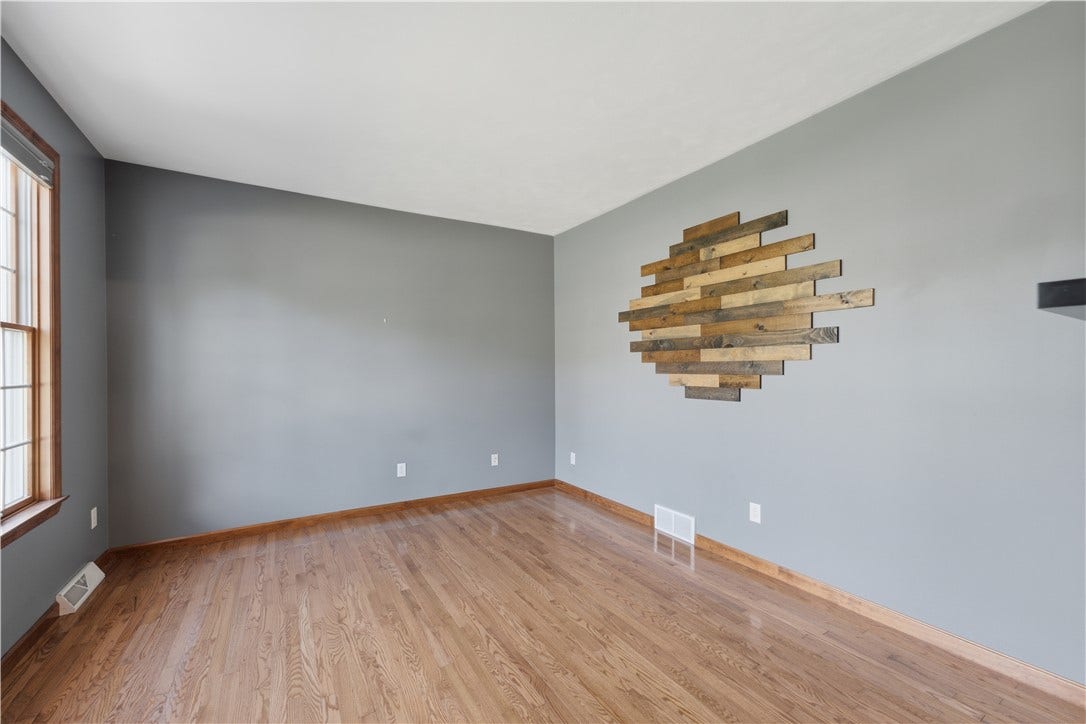 The Den is approximately 13'x12'.  This room is very versatile and could be used for a family room, office, sitting room, or even a play room for the kids!
