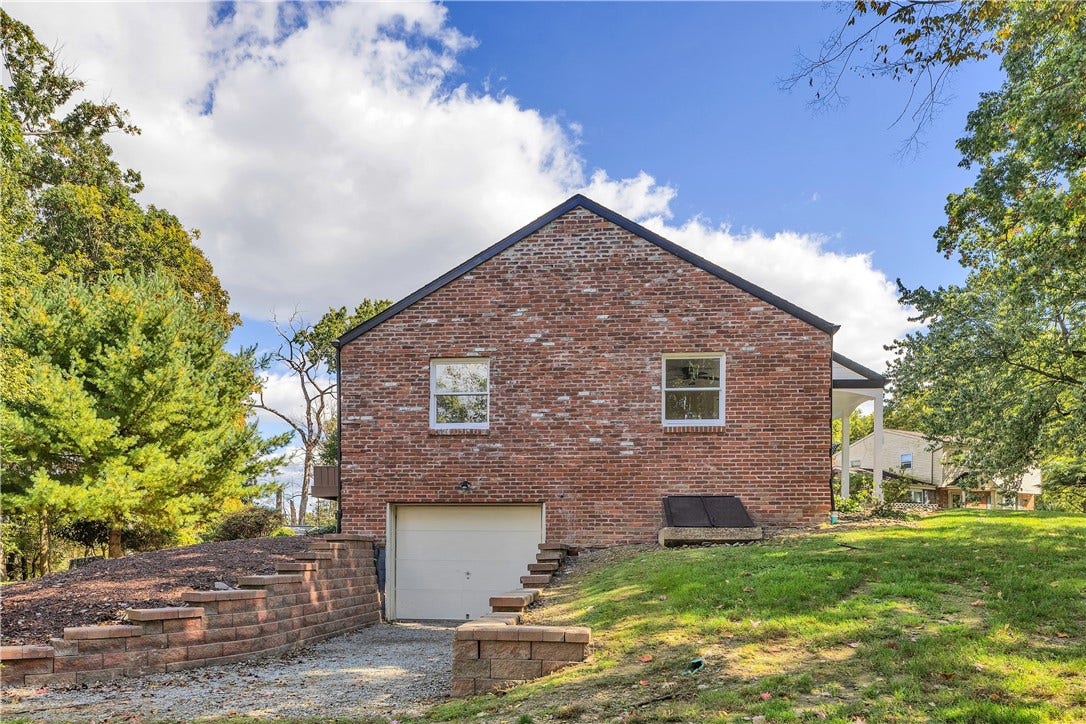 3909 Glencoe Court, Murrysville, PA 15668 3rd Garage on left side of the home - perfect for a 2rd vehicle, boat, additional storage or workshop!