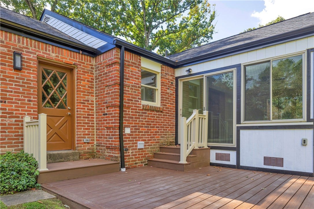 3909 Glencoe Court, Murrysville, PA 15668 Rear deck accessible from the attached garage and sunroom.