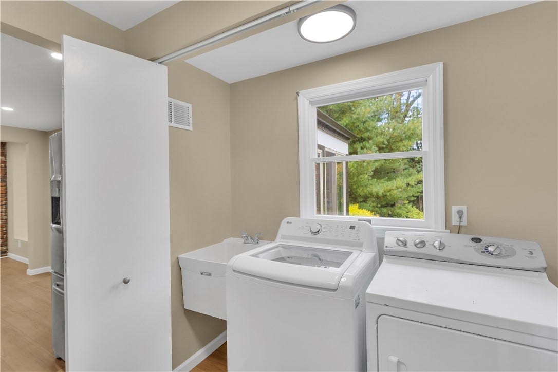 3909 Glencoe Court, Murrysville, PA 15668 7x6 Laundry area off the kitchen and garage with new utility sink. Washer/Dryer are included!