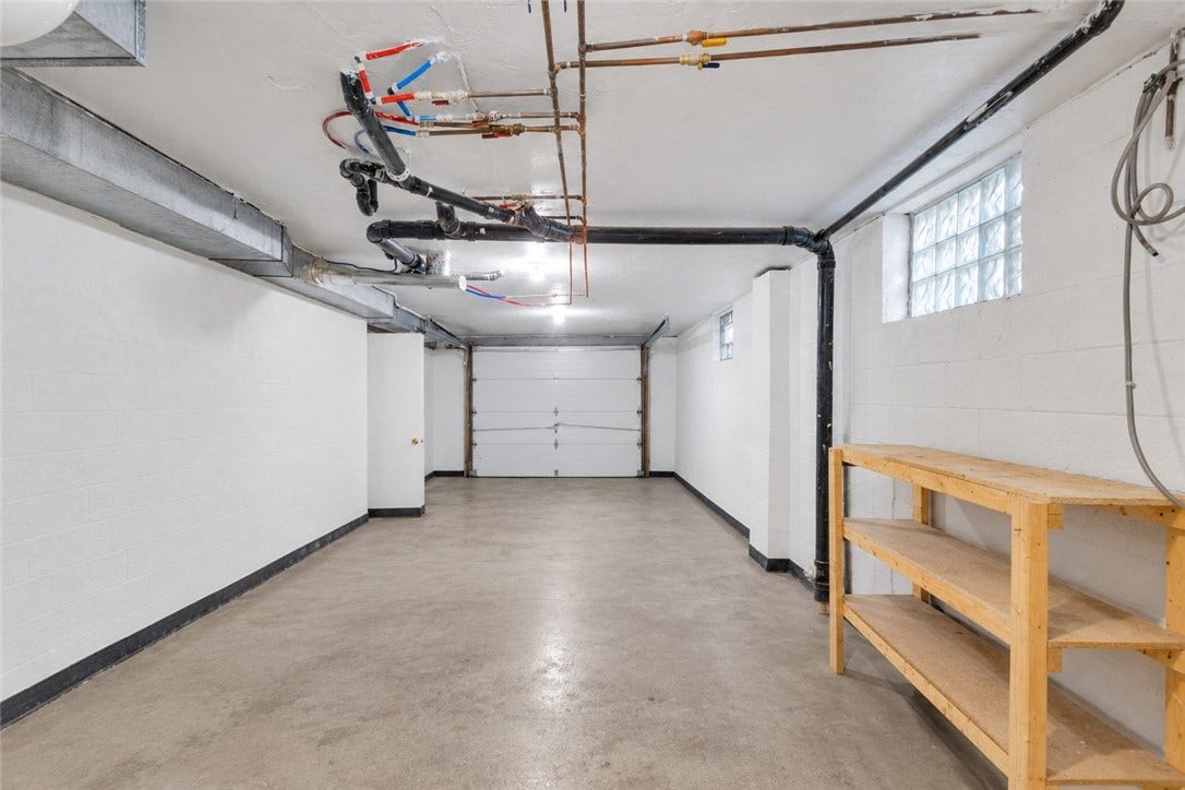 3909 Glencoe Court, Murrysville, PA 15668 28x12 Oversized 3rd Integral Garage / Workshop - part of basement, accessible from left side of the home.
