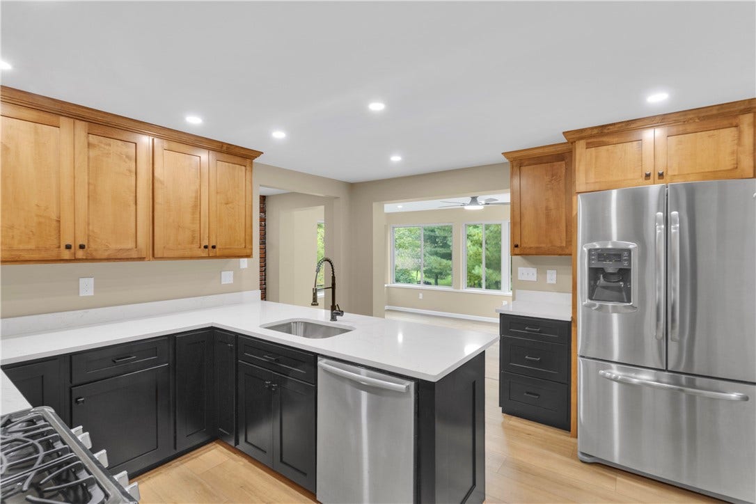 3909 Glencoe Court, Murrysville, PA 15668 All new Bosch, Frigidaire Gallery and GE appliances. Open to the Sunroom, Family Room, and Dining Room.