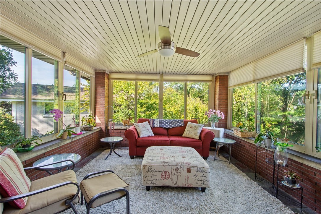 4742 Jewel Dr, Pittsburgh, PA 15236 A perfect retreat with 3 walls of windows that flood the space with natural light.