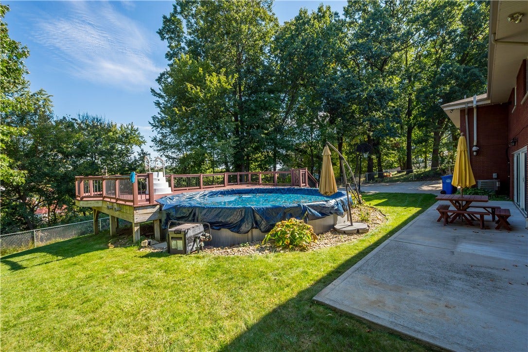 4742 Jewel Dr, Pittsburgh, PA 15236 The backdrop of mature trees provides privacy and just the right amount of shade.