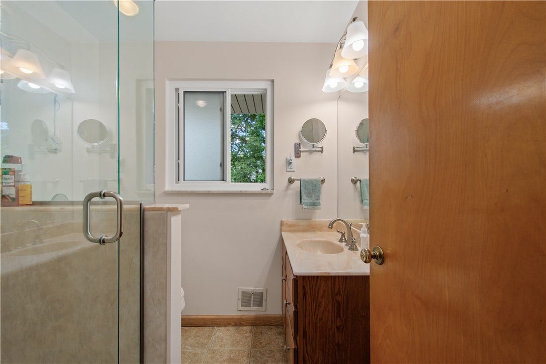 4742 Jewel Dr, Pittsburgh, PA 15236 Just steps from your primary suite is your very own private bathroom.