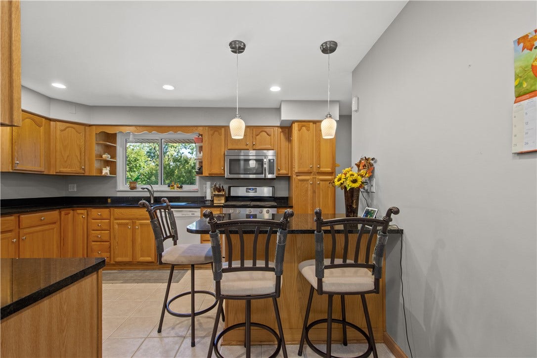 4742 Jewel Dr, Pittsburgh, PA 15236 Peninsula with seating is ideal for extra prep space or casual dining.