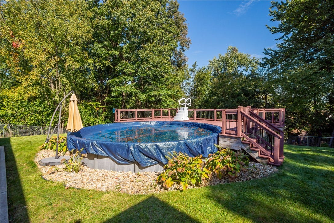 4742 Jewel Dr, Pittsburgh, PA 15236 The pool is tucked in for the cooler months ahead. The deck surround makes this summertime oasis even better.