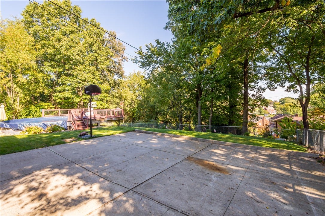 4742 Jewel Dr, Pittsburgh, PA 15236 Spacious driveway leads to the integral garage but also provides a "sport court" when the day calls for a little one-on-one competition.