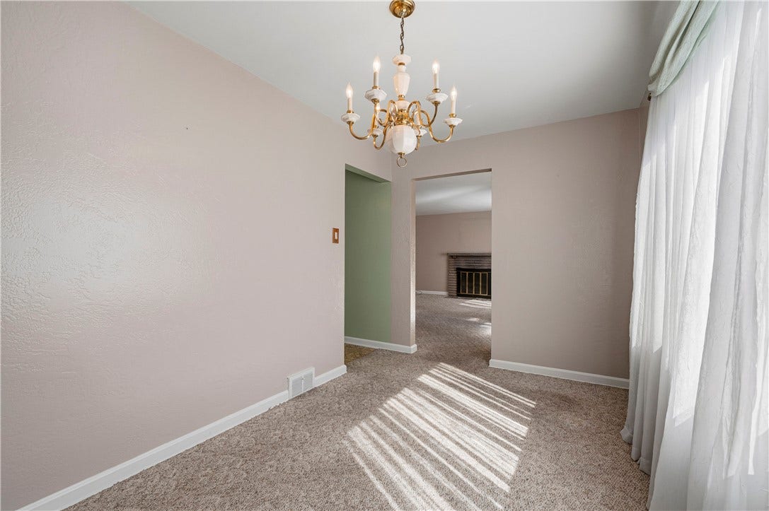 3942 Lawnview Ave, Pittsburgh, PA 15227 Dining room located directly off of living room and kitchen