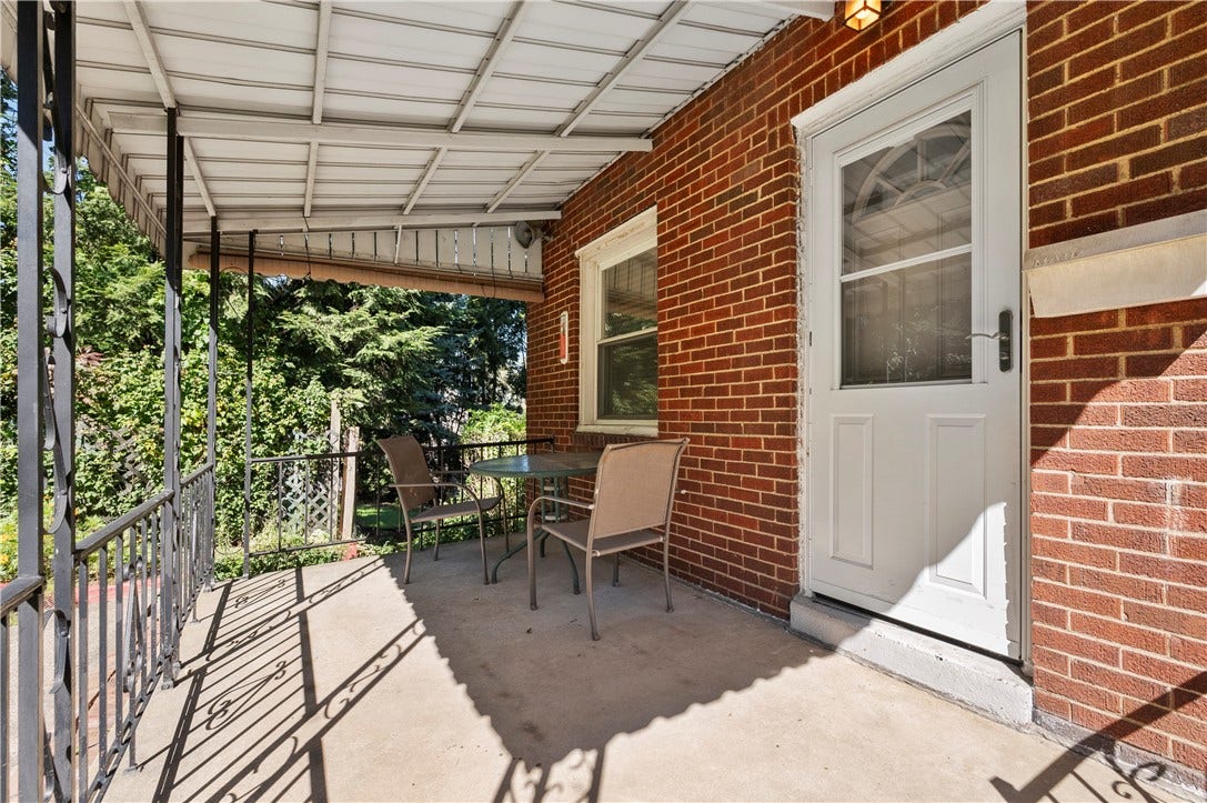 3942 Lawnview Ave, Pittsburgh, PA 15227 Covered patio on left side of home