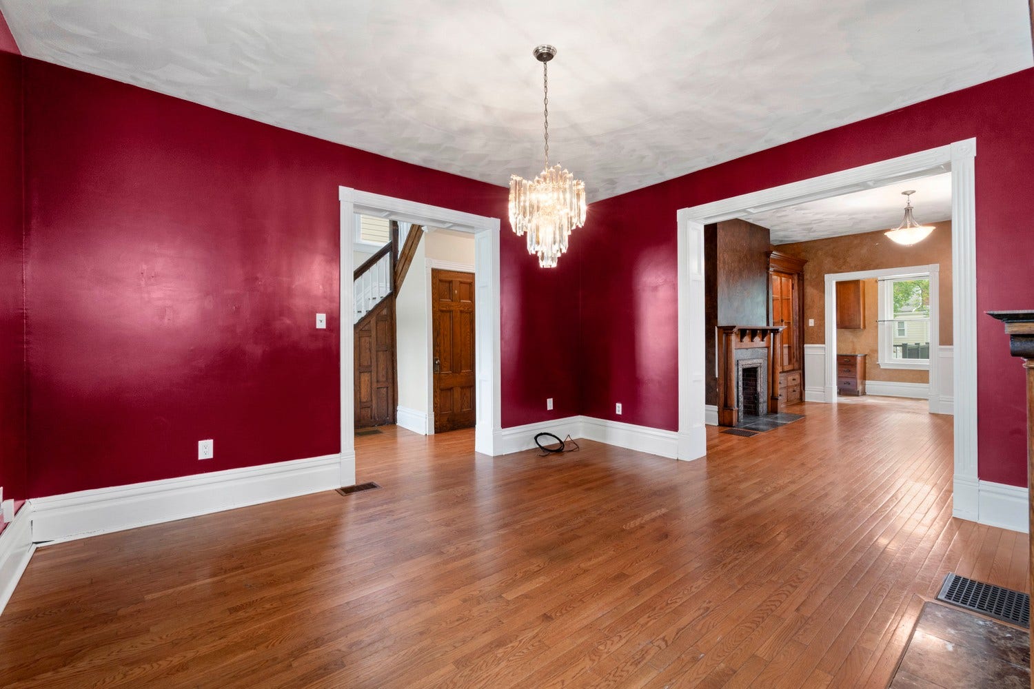 A designer touch.  The bold red walls and painted white trim make a design statement!