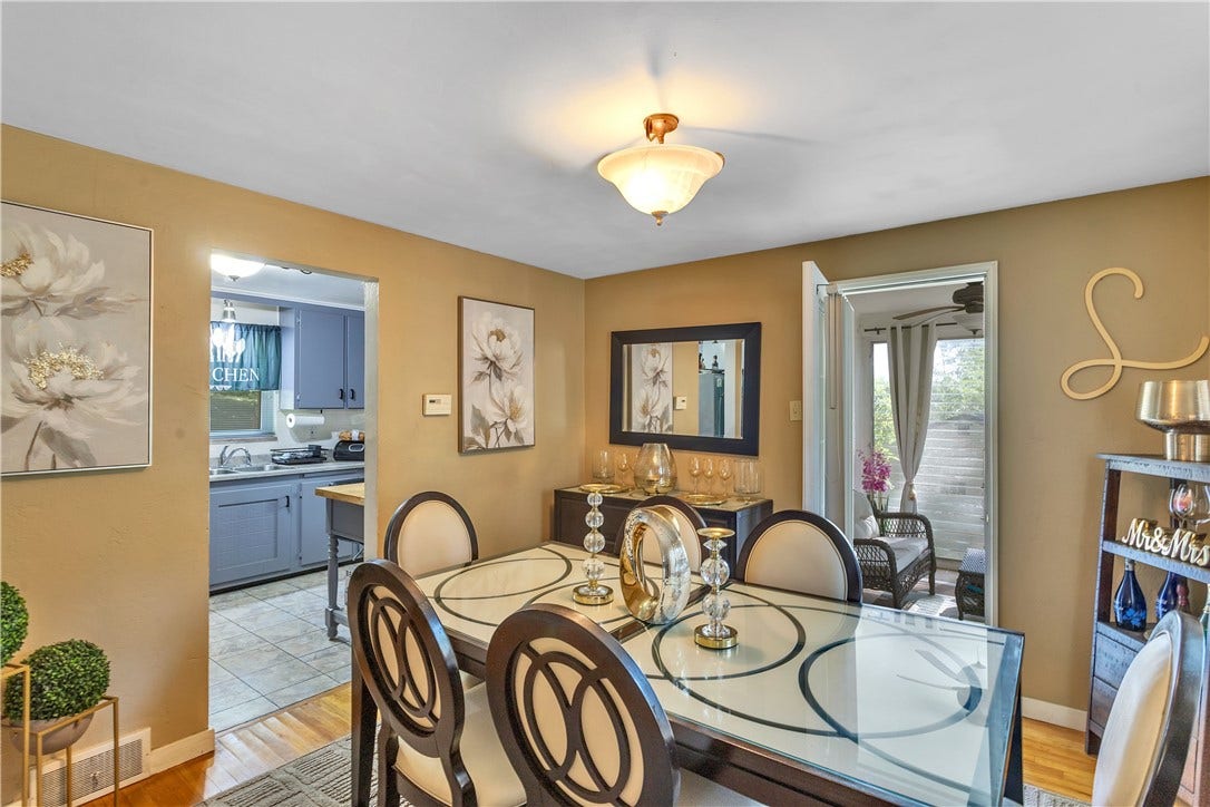 2709 Blackridge Avenue, Pittsburgh, PA 15235 Beautiful formal Dining room with hardwood floors. Off the dining room is the 3 season room!