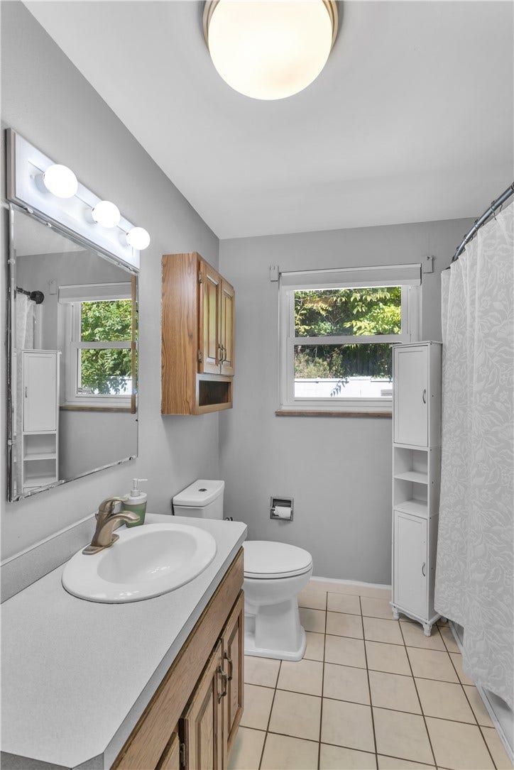 136 N Hazen Ave., Ellwood City, PA 16117 The updated bath fixtures bring a fresh, clean look to the bathroom.
