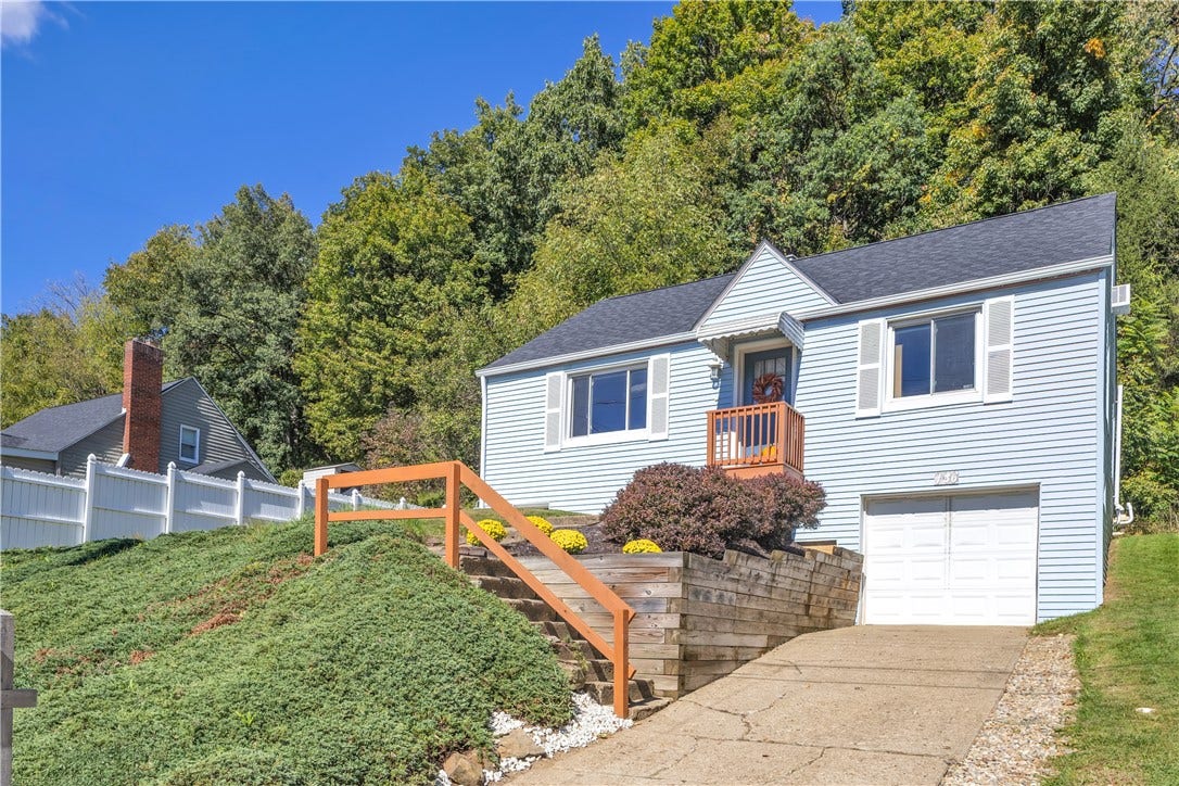 136 N Hazen Ave., Ellwood City, PA 16117 The heated, extra-deep integral garage provides ideal space for storage, hobbies, or a workshop.