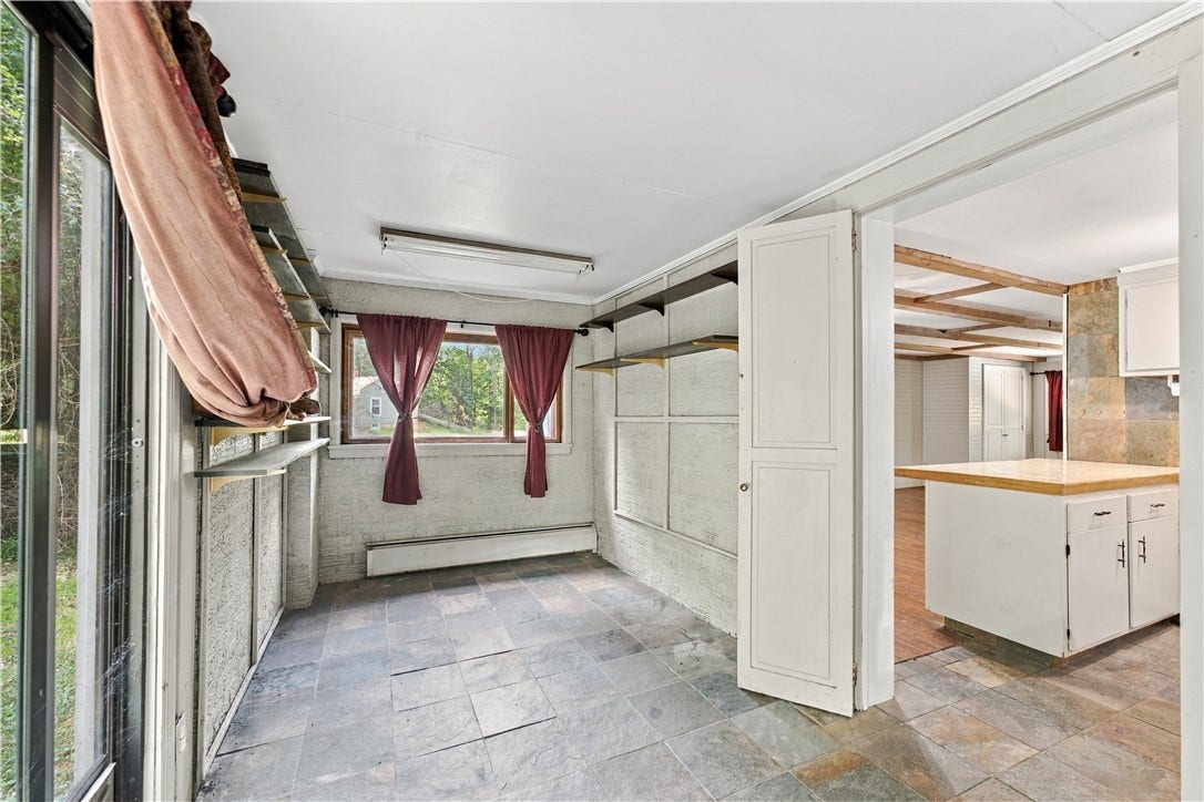Could be a Sunroom or Home Office if Desired
