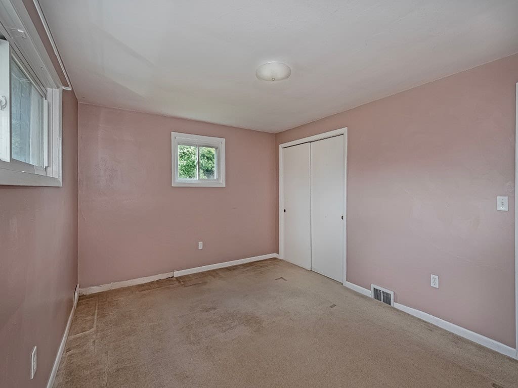 1 of the 3 bedrooms on the main level