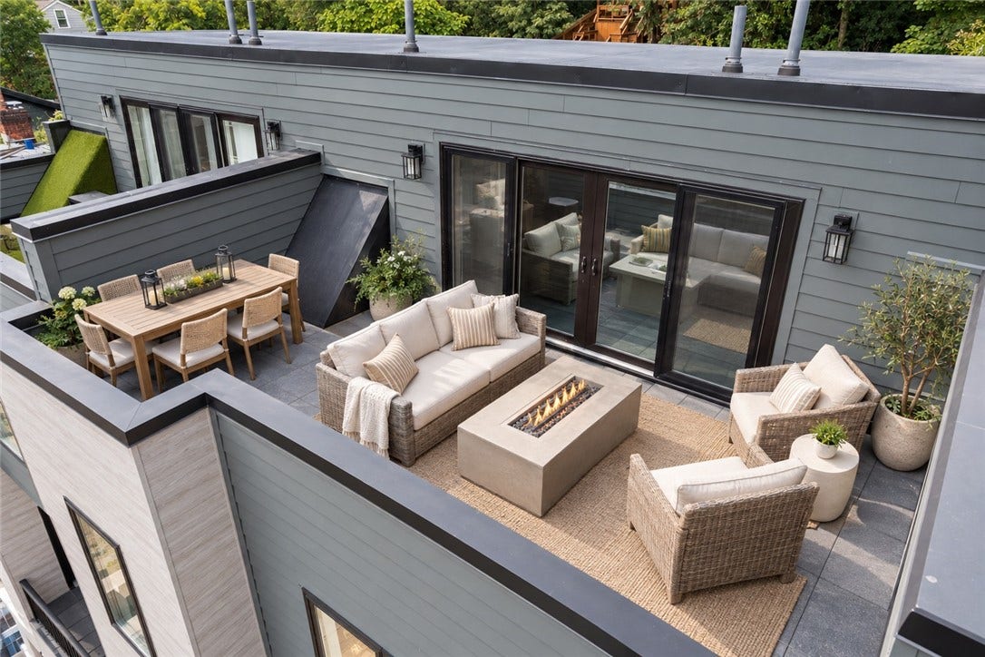 240 E Jefferson, Pittsburgh, PA 15212 VIRTUALLY STAGED- Private third-floor rooftop deck showcasing breathtaking panoramic views of the Pittsburgh skylinethe perfect setting for entertaining, relaxing, or enjoying the city lights.